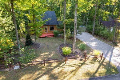 Welcome to this charming Harbor Springs home, perfectly situated on Boyne Highlands Golf Courses in Michigan - for sale on GolfHomes.com, golf home, golf lot