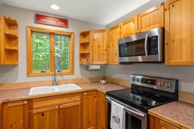 Welcome to this charming Harbor Springs home, perfectly situated on Boyne Highlands Golf Courses in Michigan - for sale on GolfHomes.com, golf home, golf lot