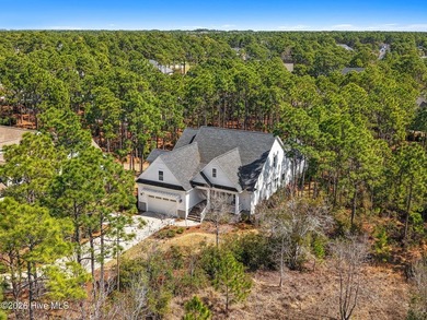 Nestled at the end of a long private driveway on a beautiful on Members Club At St. James Plantation in North Carolina - for sale on GolfHomes.com, golf home, golf lot
