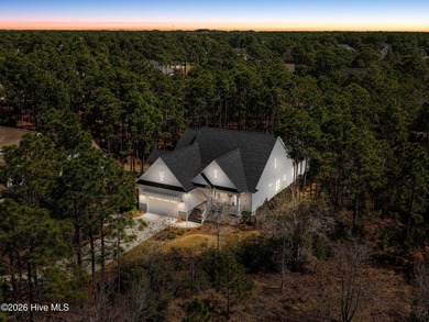 Nestled at the end of a long private driveway on a beautiful on Members Club At St. James Plantation in North Carolina - for sale on GolfHomes.com, golf home, golf lot