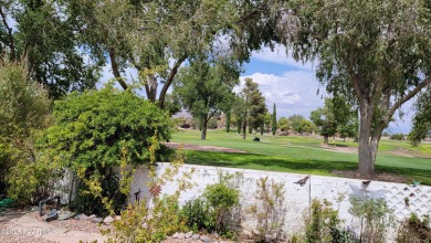 Lovely home located at the first green of Cerbat Cliffs Golf on Cerbat Cliffs Golf Course in Arizona - for sale on GolfHomes.com, golf home, golf lot
