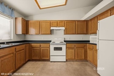 This FULLY FURNISHED town home is located on a spacious home on CasaBlanca Resort and Casino in Nevada - for sale on GolfHomes.com, golf home, golf lot