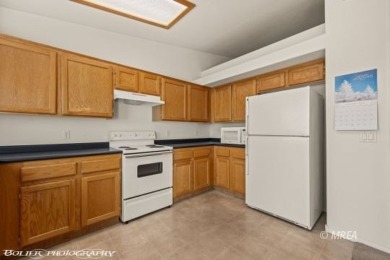 This FULLY FURNISHED town home is located on a spacious home on CasaBlanca Resort and Casino in Nevada - for sale on GolfHomes.com, golf home, golf lot