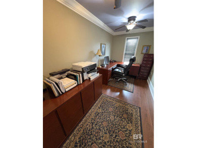 Ever dream of living on Marina Road? This single-story home on Orange Beach Golf Center in Alabama - for sale on GolfHomes.com, golf home, golf lot