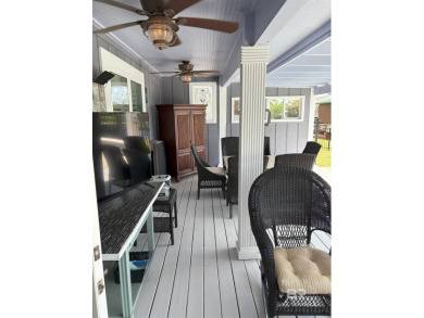 Ever dream of living on Marina Road? This single-story home on Orange Beach Golf Center in Alabama - for sale on GolfHomes.com, golf home, golf lot