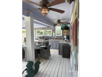 Ever dream of living on Marina Road? This single-story home on Orange Beach Golf Center in Alabama - for sale on GolfHomes.com, golf home, golf lot