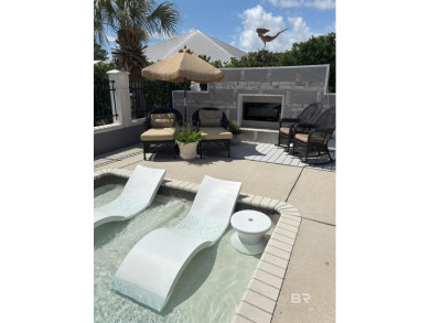 Ever dream of living on Marina Road? This single-story home on Orange Beach Golf Center in Alabama - for sale on GolfHomes.com, golf home, golf lot
