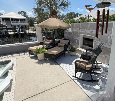 Ever dream of living on Marina Road? This single-story home on Orange Beach Golf Center in Alabama - for sale on GolfHomes.com, golf home, golf lot
