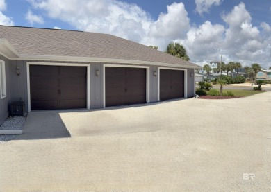 Ever dream of living on Marina Road? This single-story home on Orange Beach Golf Center in Alabama - for sale on GolfHomes.com, golf home, golf lot