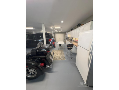 Ever dream of living on Marina Road? This single-story home on Orange Beach Golf Center in Alabama - for sale on GolfHomes.com, golf home, golf lot
