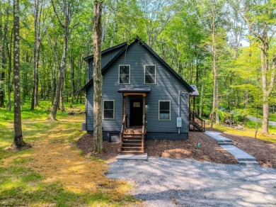 Welcome to *Altitude Adjustment,* a stunning new construction on Alpine Lake Resort in West Virginia - for sale on GolfHomes.com, golf home, golf lot