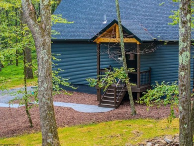 Welcome to *Altitude Adjustment,* a stunning new construction on Alpine Lake Resort in West Virginia - for sale on GolfHomes.com, golf home, golf lot