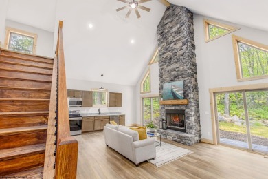Welcome to *Altitude Adjustment,* a stunning new construction on Alpine Lake Resort in West Virginia - for sale on GolfHomes.com, golf home, golf lot