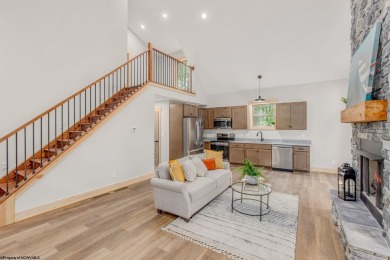 Welcome to *Altitude Adjustment,* a stunning new construction on Alpine Lake Resort in West Virginia - for sale on GolfHomes.com, golf home, golf lot