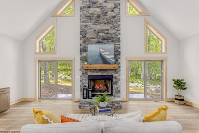 Welcome to *Altitude Adjustment,* a stunning new construction on Alpine Lake Resort in West Virginia - for sale on GolfHomes.com, golf home, golf lot