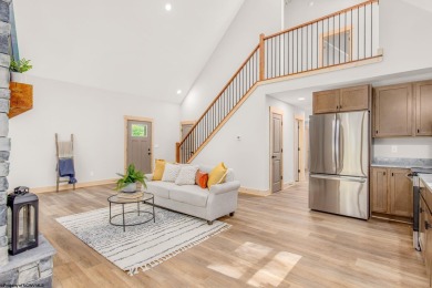 Welcome to *Altitude Adjustment,* a stunning new construction on Alpine Lake Resort in West Virginia - for sale on GolfHomes.com, golf home, golf lot