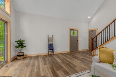 Welcome to *Altitude Adjustment,* a stunning new construction on Alpine Lake Resort in West Virginia - for sale on GolfHomes.com, golf home, golf lot