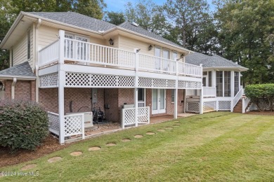 Location, location, location! This stunning, custom home sits on on Lockwood Folly Country Club in North Carolina - for sale on GolfHomes.com, golf home, golf lot