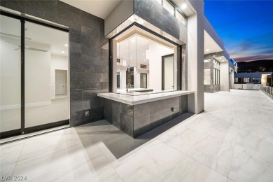 This luxurious & modern estate features double-gated entrance on Dragon Ridge Country Club in Nevada - for sale on GolfHomes.com, golf home, golf lot