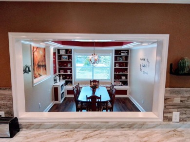 Don't miss this one! Beautifully shaded, freshly painted, well on Wildwood Country Club in Florida - for sale on GolfHomes.com, golf home, golf lot