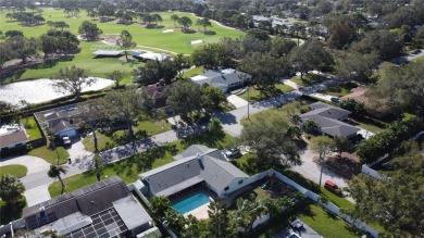 Nestled in the heart of Belleair, this charming 4-bedroom on Belleview Biltmore Golf Club in Florida - for sale on GolfHomes.com, golf home, golf lot