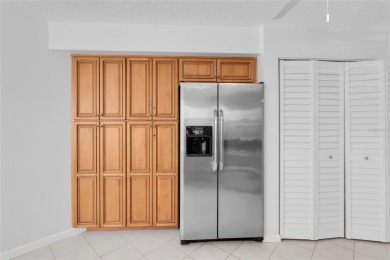 Newly painted two bedroom two full bath one level condo on the on Isla Del Sol Yacht and Country Club in Florida - for sale on GolfHomes.com, golf home, golf lot