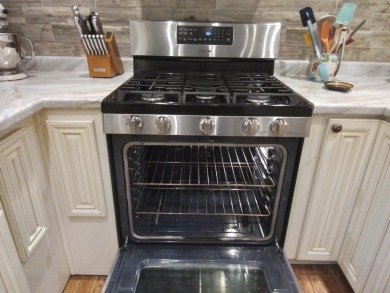 Don't miss this one! Beautifully shaded, freshly painted, well on Wildwood Country Club in Florida - for sale on GolfHomes.com, golf home, golf lot