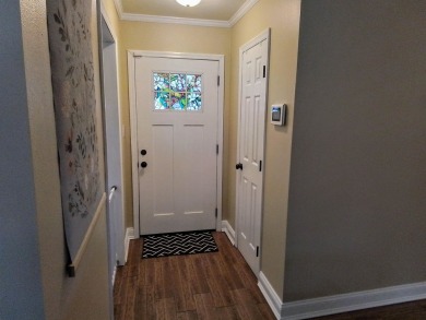 Don't miss this one! Beautifully shaded, freshly painted, well on Wildwood Country Club in Florida - for sale on GolfHomes.com, golf home, golf lot
