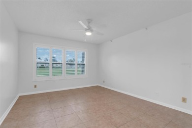 Newly painted two bedroom two full bath one level condo on the on Isla Del Sol Yacht and Country Club in Florida - for sale on GolfHomes.com, golf home, golf lot