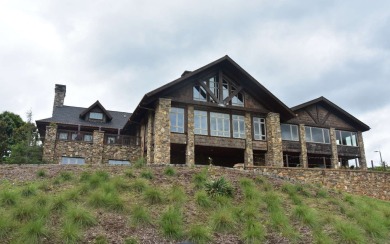 Overlooking the 7th green and fairway from this elevated long on Mountain Harbour Golf Club in North Carolina - for sale on GolfHomes.com, golf home, golf lot