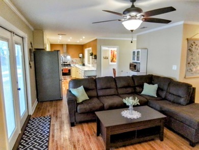 Don't miss this one! Beautifully shaded, freshly painted, well on Wildwood Country Club in Florida - for sale on GolfHomes.com, golf home, golf lot