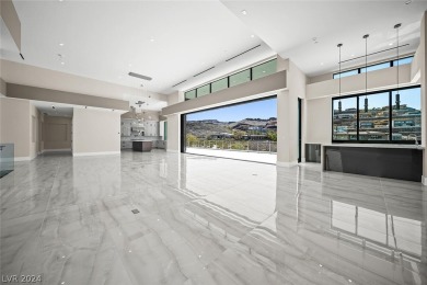 This luxurious & modern estate features double-gated entrance on Dragon Ridge Country Club in Nevada - for sale on GolfHomes.com, golf home, golf lot