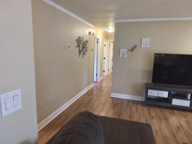 Don't miss this one! Beautifully shaded, freshly painted, well on Wildwood Country Club in Florida - for sale on GolfHomes.com, golf home, golf lot