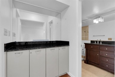 Newly painted two bedroom two full bath one level condo on the on Isla Del Sol Yacht and Country Club in Florida - for sale on GolfHomes.com, golf home, golf lot