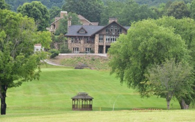 Overlooking the 7th green and fairway from this elevated long on Mountain Harbour Golf Club in North Carolina - for sale on GolfHomes.com, golf home, golf lot