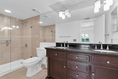 Newly painted two bedroom two full bath one level condo on the on Isla Del Sol Yacht and Country Club in Florida - for sale on GolfHomes.com, golf home, golf lot