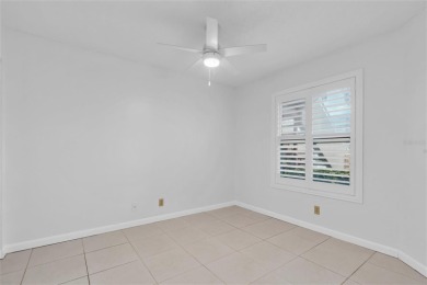 Newly painted two bedroom two full bath one level condo on the on Isla Del Sol Yacht and Country Club in Florida - for sale on GolfHomes.com, golf home, golf lot