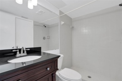 Newly painted two bedroom two full bath one level condo on the on Isla Del Sol Yacht and Country Club in Florida - for sale on GolfHomes.com, golf home, golf lot