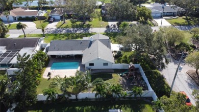 Nestled in the heart of Belleair, this charming 4-bedroom on Belleview Biltmore Golf Club in Florida - for sale on GolfHomes.com, golf home, golf lot