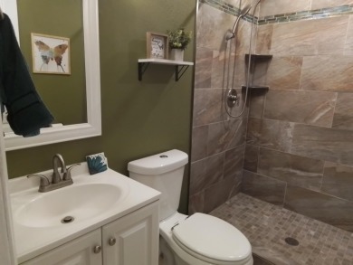 Don't miss this one! Beautifully shaded, freshly painted, well on Wildwood Country Club in Florida - for sale on GolfHomes.com, golf home, golf lot