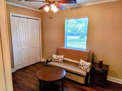 Don't miss this one! Beautifully shaded, freshly painted, well on Wildwood Country Club in Florida - for sale on GolfHomes.com, golf home, golf lot