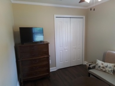 Don't miss this one! Beautifully shaded, freshly painted, well on Wildwood Country Club in Florida - for sale on GolfHomes.com, golf home, golf lot