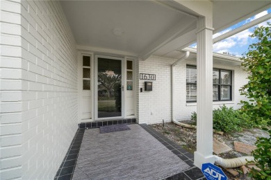 Nestled in the heart of Belleair, this charming 4-bedroom on Belleview Biltmore Golf Club in Florida - for sale on GolfHomes.com, golf home, golf lot