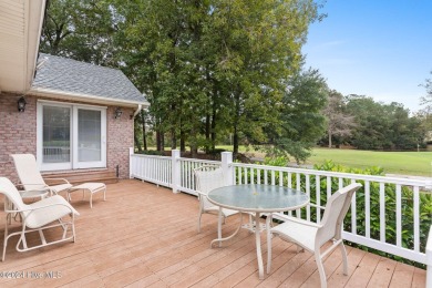 Location, location, location! This stunning, custom home sits on on Lockwood Folly Country Club in North Carolina - for sale on GolfHomes.com, golf home, golf lot