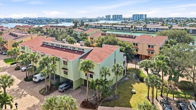 COASTAL RETREAT IN TREASURE ISLAND! Welcome to this on Treasure Bay Golf and Tennis in Florida - for sale on GolfHomes.com, golf home, golf lot