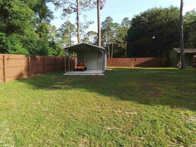 Don't miss this one! Beautifully shaded, freshly painted, well on Wildwood Country Club in Florida - for sale on GolfHomes.com, golf home, golf lot