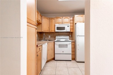 Beautiful apartment with lake front view in the lovely Pine on Pine Island Ridge Country Club in Florida - for sale on GolfHomes.com, golf home, golf lot