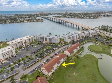 Newly painted two bedroom two full bath one level condo on the on Isla Del Sol Yacht and Country Club in Florida - for sale on GolfHomes.com, golf home, golf lot