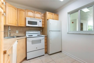 Beautiful apartment with lake front view in the lovely Pine on Pine Island Ridge Country Club in Florida - for sale on GolfHomes.com, golf home, golf lot