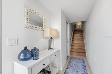 COASTAL RETREAT IN TREASURE ISLAND! Welcome to this on Treasure Bay Golf and Tennis in Florida - for sale on GolfHomes.com, golf home, golf lot